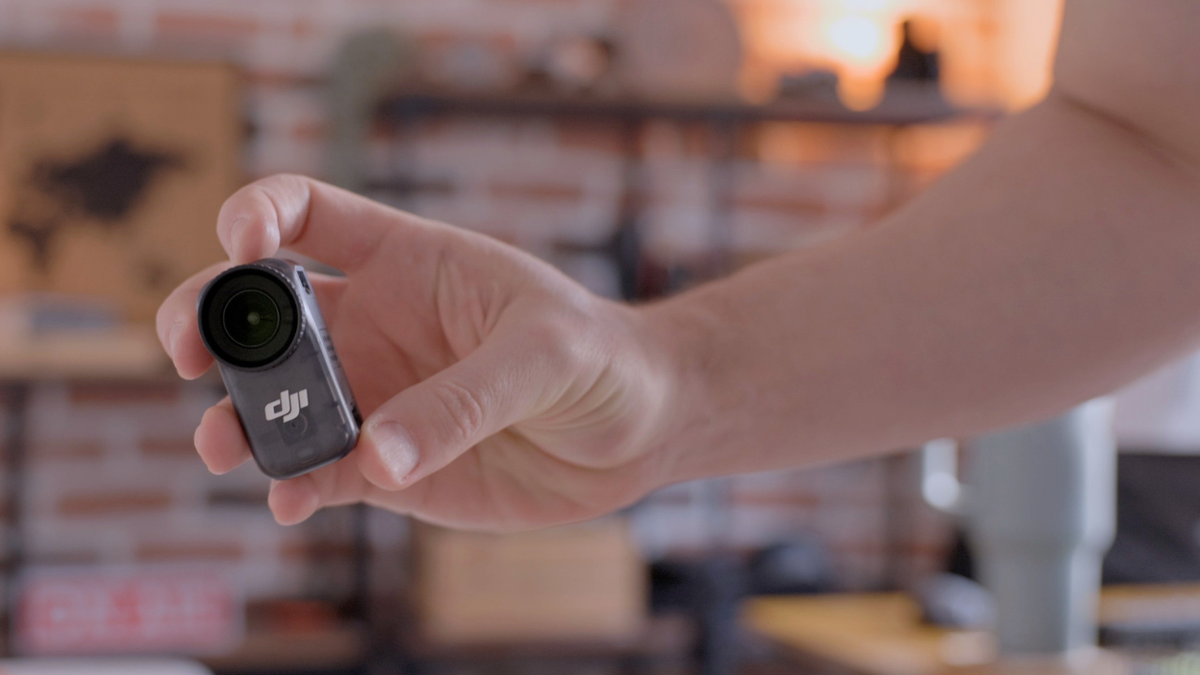 DJI Osmo Nano camera being held on hand