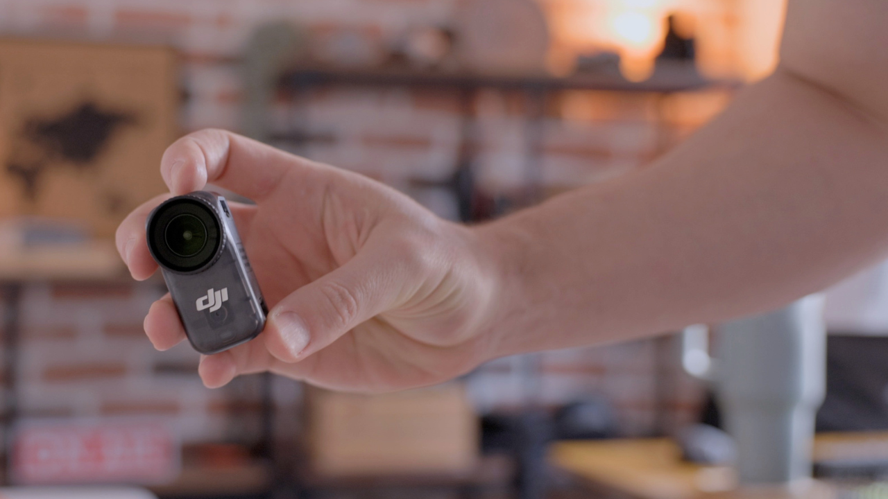 DJI Osmo Nano camera being held on hand